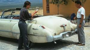 Dustin Hoffman & Tom Cruise in a scene from “Rain Man” with 1949 Buick Roadmaster