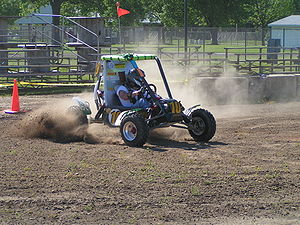 Baja SAE vehicle cornering on a test track (Wikipedia)