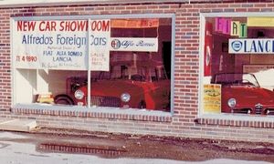 Alfa Romeo and Fiat models in Alfredo’s showroom in the early ‘60’s (Photo Automotive News)